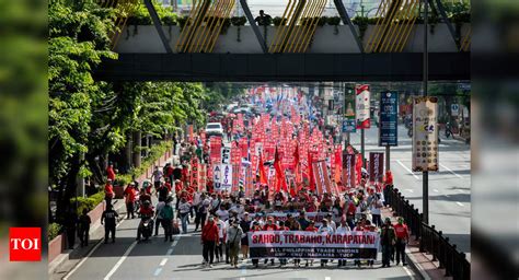 On May Day, workers rally for better labor conditions